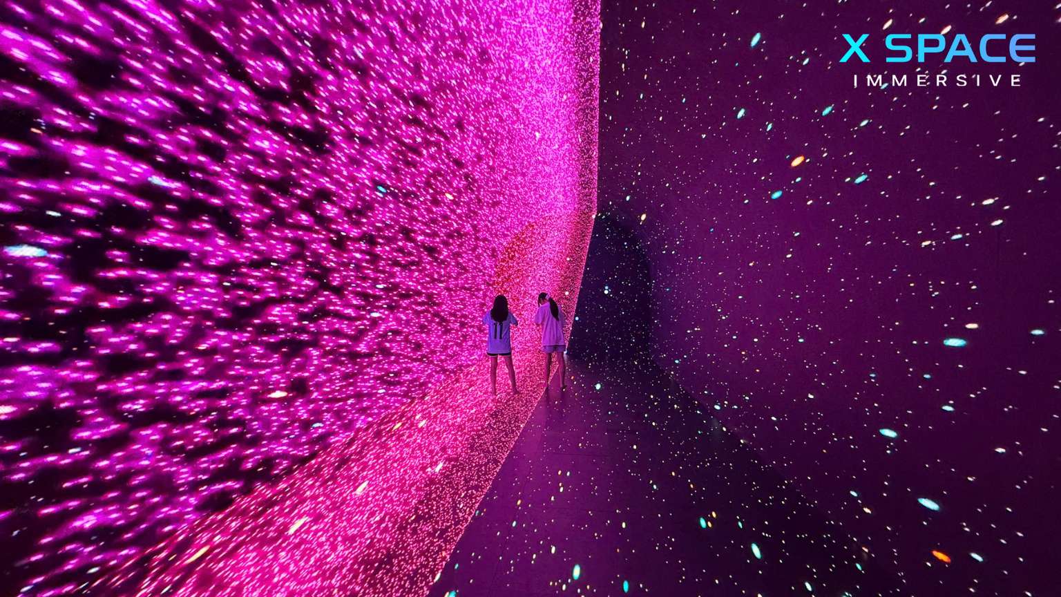 Visitors exploring X Space Immersive digital art exhibition in Hanoi